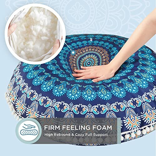 Hand pressing a firm foam-filled mandala floor cushion.