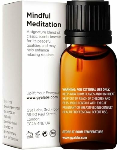 Mindful Meditation essential oil bottle with packaging.