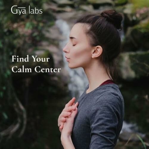 Woman meditating outdoors with closed eyes and hands on chest.